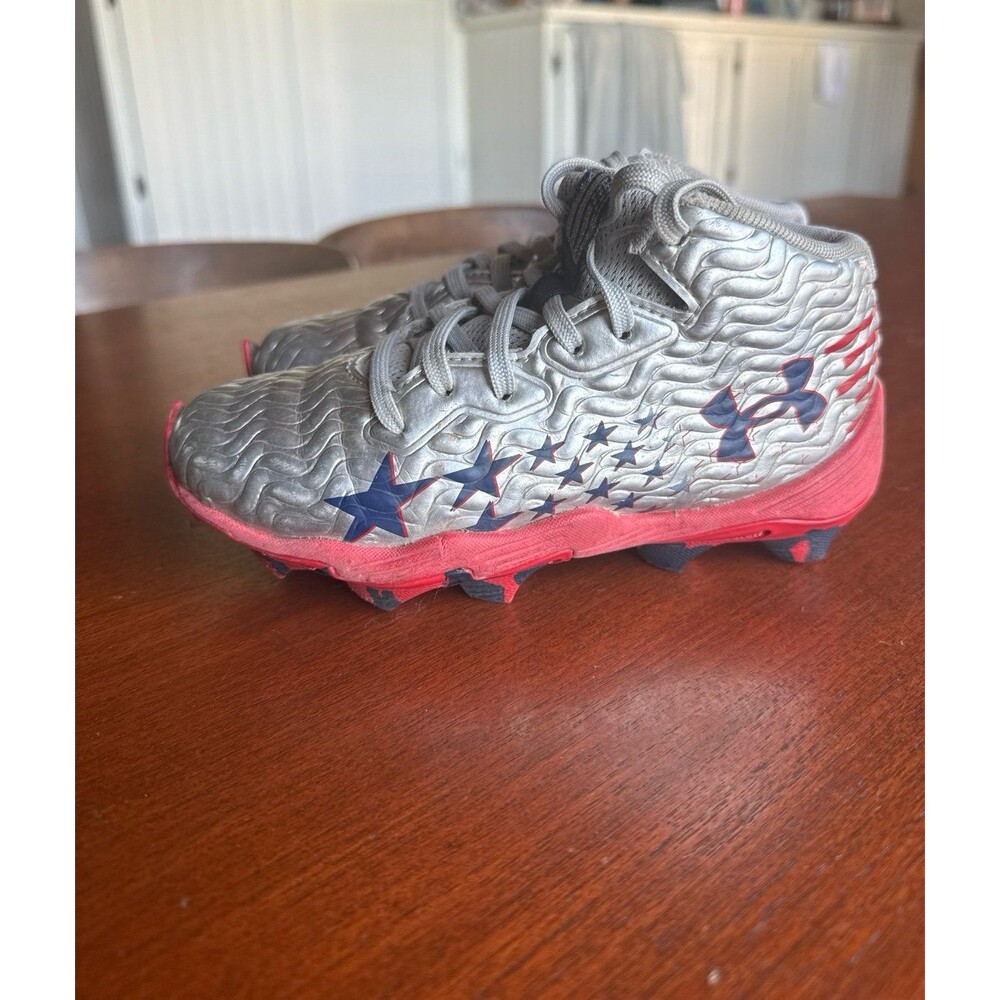 Under Armour Spotlight Hammer mid youth cleats